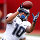Zavier Scott #10 of the Connecticut Huskies warms up before the game against the Indiana Hoosiers at Memorial Stadium on September 21, 2019 in Bloomington, Indiana.